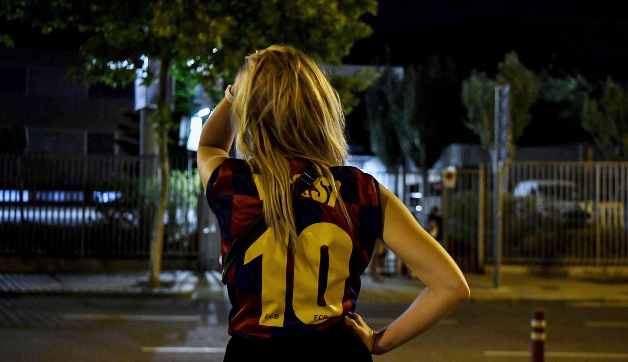 Megabintang sepakbola Argentina itu selama ini menjadi ikon Barcelona di sepakbola modern. La Pulga sudah bersama klub selama lebih dari 20 tahun dan mencetak 672 gol dan 305 assist dalam 778 penampilan di tim utama. (Foto: AFP/Pau Barrena)