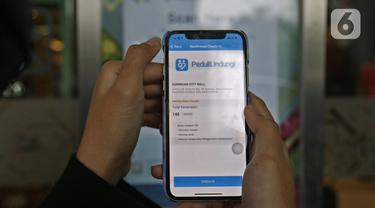 080474100_1628588208-20210810-Pengunjung_Mal_Wajib_Scan_Barcode_Aplikasi_PeduliLindungi-4