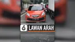 NEKAT LAWAN ARAH SAAT MACET, MOBIL INI KENA BATUNYA