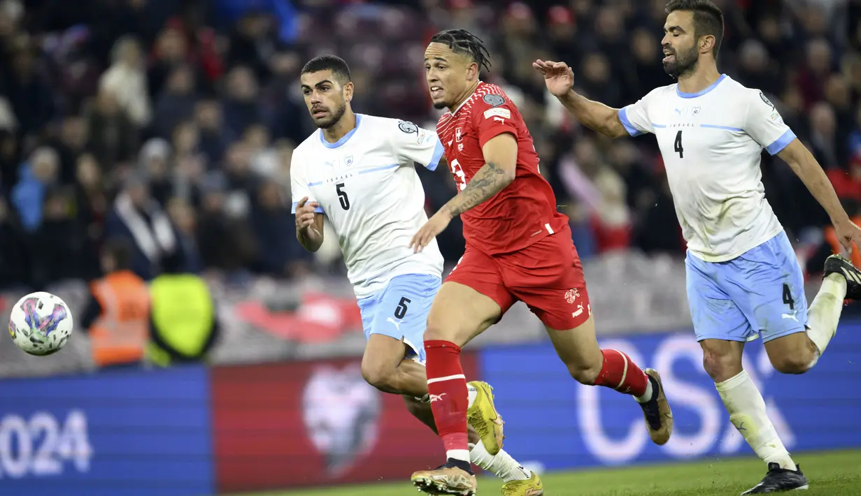 Tiga gol Swiss ditorehkan oleh Ruben Varga (39), Zeki Amdouni (47), dan Silvan Widmer (52). (Salvatore Di Nolfi/Keystone via AP)