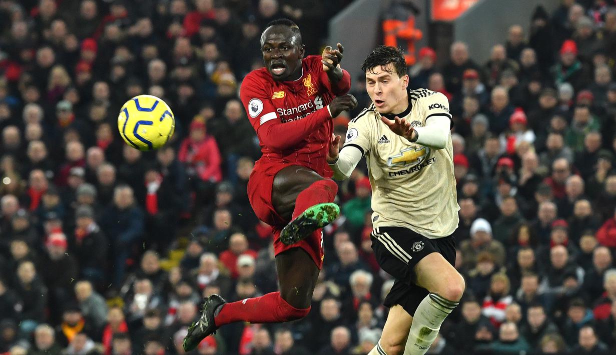 Berkat performa apiknya di Liverpool, klub elite Real Madrid diyakini sangat tertarik untuk mendatangkan Mane. Los Blancos pun kabarnya bersedia menggelontorkan dana besar demi mewujudkan ambisinya tersebut. (AFP/Paul Ellis)