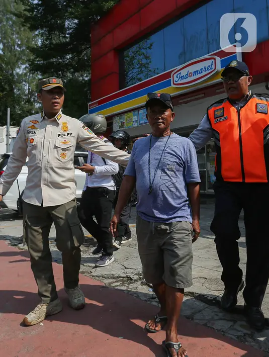 Kepala Dinas Perhubungan (Dishub DKI Jakarta), Syafrin Liputo mengatakan kegiatan penindakan juru parkir liar di minimarket akan dilakukan hingga 15 Juni 2024. (Liputan6.com/Angga Yuniar)