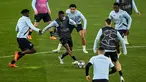 Para pemain Brugge menghadiri sesi latihan di stadion Luz, Lisbon, Senin (6/3/2023). Hari pertama babak 16 besar Liga Champions leg kedua mempertemukan Benfica menjamu Club Brugge di Stadion Da Luz Rabu (8/3/2023) dini hari WIB. (Photo by PATRICIA DE MELO MOREIRA / AFP)