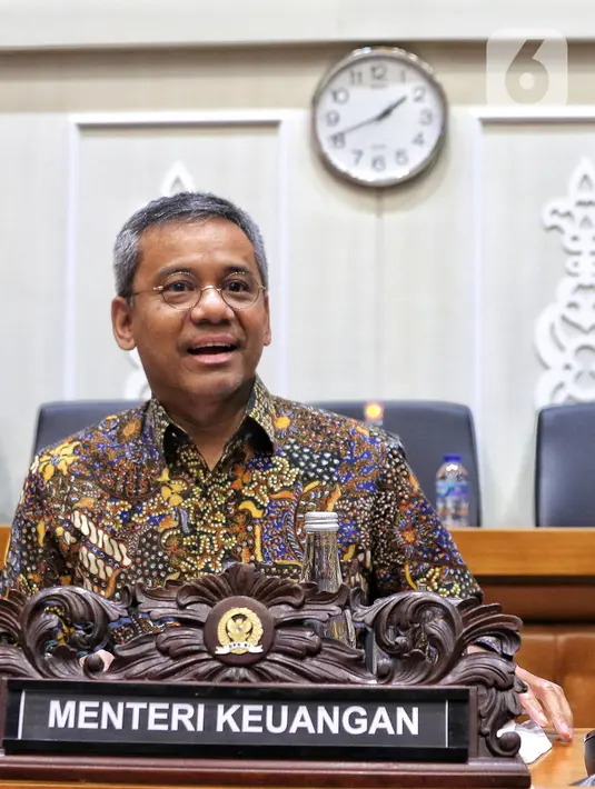 Wakil Menteri Keuangan (Wamenkeu) Suahasil Nazara mengikuti rapat kerja dengan Badan Legislasi DPR RI di kompleks Parlemen, Jakarta, Kamis (18/8/2022). Raker tersebut dalam rangka harmonisasi Rancangan Undang-Undang (RUU) tentang pengembangan dan penguatan sektor keuangan. (Liputan6.com/Angga Yuniar)