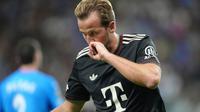 Ekspresi Harry Kane usai mencetak gol ke gawang Pafos FC,  Rabu (1/10/2025) (AP Photo/Petros Karadjias)