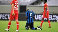 Romelu Lukaku bersyukur setelah membawa Inter Milan mengandaskan Bayer Leverkusen. (Martin Meissner / POOL / AFP)