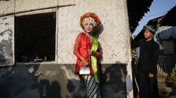 Festival Ngarot menandai dimulainya musim tanam padi. (Timur MATAHARI/AFP)