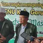 Ketua LBM PC NU Abdullah Syafi’i memberikan keterangan kepada wartawan setekah pelaksanaan Batsul Masail Diniyah mengenai Khilafah, di Gedung Hejo NU Garut. (Liputan6.com/Jayadi Supriadin)