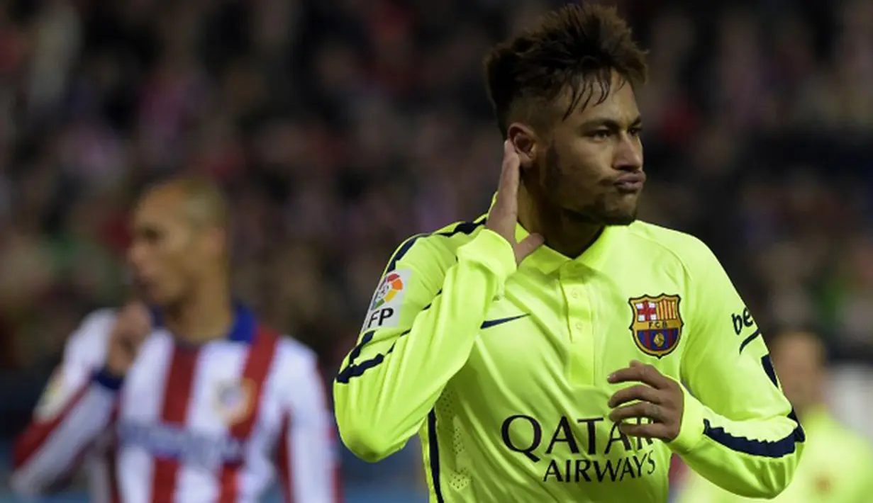 Selebrasi Neymar usai mencetak gol keduanya di laga kedua perempat final Copa del Rey antara Atletico Madrid versus Barcelona. Selebrasinya ini dianggap melecehkan oleh pemain Atletico Madrid, Spanyol, Kamis (29/1/2015). (AFP Photo)