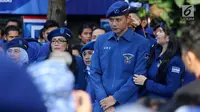 Agus Harimurti Yudhoyono dan istri, Anisa Pohan saat pengukuhan sebagai Komandan Satuan Tugas Bersama (Kogasma) oleh Ketua Umum Partai Demokrat Susilo Bambang Yudhoyono, untuk Pemilukada dan Pilpres 2019, Jakarta, Sabtu (17/2). (Liputan6.com/Johan Tallo)