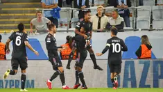 Pemain Juventus Alex Sandro (atas) merayakan dengan rekan setimnya usai mencetak gol ke gawang Malmo pada pertandingan Grup H Liga Champions di Malmo New Stadium, Malmo, Swedia, Selasa (14/9/2021). Juventus menang 3-0. (Andreas Hillergren/TT News Agency via AP)