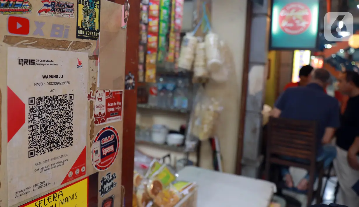 Penetapan tarif ini bertujuan untuk menjaga keberlanjutan penyelenggaraan layanan transaksi pembayaran untuk masyarakat, khususnya untuk menutupi biaya yang timbul dari penyediaan layanan QRIS. (Liputan6.com/Johan Tallo)