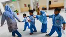 Pemeriksaan kesehatan gratis untuk pelajar ini penting dilakukan agar generasi masa depan dapat tumbuh dengan sehat. (Merdeka.com/Arie Basuki)