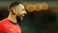 Pemain Mesir, Mohamed Salah melakukan selebrasi setelah mencetak gol ke gawang Benin dalam laga 16 besar Piala Afrika 2025 di Grand Stadium, Agadir, Maroko, Senin (05/01/2026) waktu setempat. (AP Photo/Mosa'ab Elshamy)