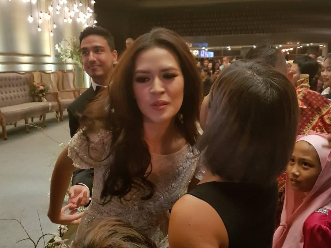 Widi Mulia di resepsi pernikahan Raisa-Hamish Daud. (Instagram - @widimulia)
