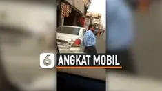 KESAL JALAN TERHALANG, PRIA ANGKAT MOBIL YANG PARKIR SEMBARANGAN