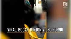Beredar rekaman seorang bocah menonton video porno melalui sebuah handphone.