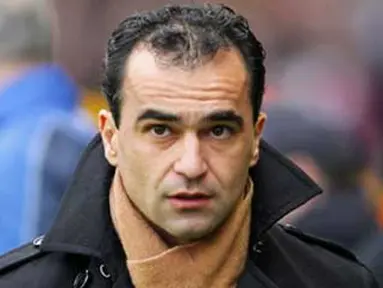 Ekspresi manajer Wigan Athletic, Roberto Martinez sebelum laga EPL melawan Wolverhampton Wanderers di Molineux Stadium, 16 Januari 2010. AFP PHOTO / Chris Ratcliffe