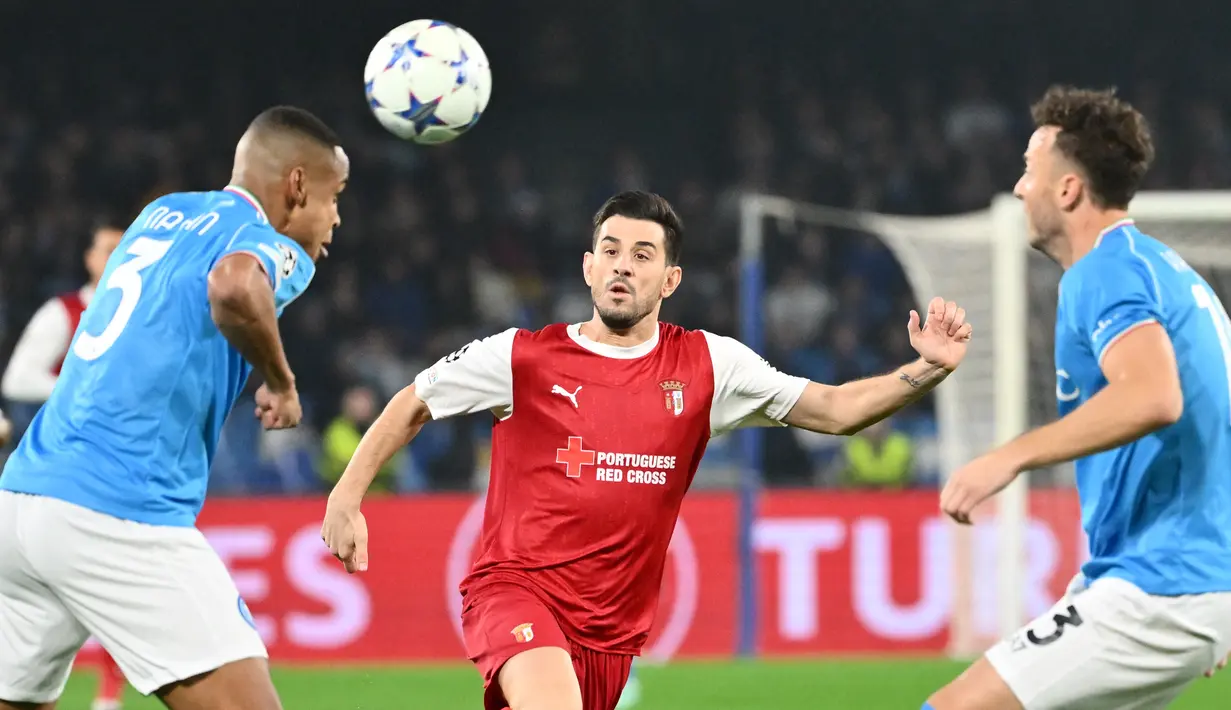 Napoli meraih tiga poin penuh dan berhak lolos ke fase knock out Liga Champions 2023/2024 dengan poin 10 dari 6 laga, hasil tiga kemenangan, sekali imbang dan dua kali kalah. (Alberto PIZZOLI / AFP)