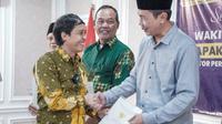Wakil Menteri Agraria dan Tata Ruang/Kepala Badan Pertanahan Nasional (ATR/BPN) Raja Juli Antoni melakukan kunjungan ke Karawang, Jawa Barat. (Foto: Istimewa).