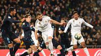 Karim Benzema berhasil cetak gol untuk Real Madrid saat lawan Sociedad (PIERRE-PHILIPPE MARCOU / AFP)