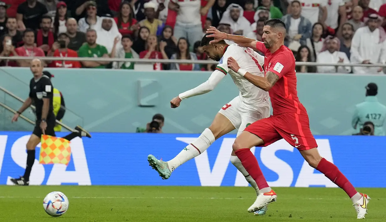 <p>Youssef En-Nesyri kemudian berhasil membawa Maroko unggul 2-0 atas Kanada. Ia sukses memanfaatkan umpan terobos yang dikirim oleh Hakim Ziyech dari sisi kanan Maroko. (AP/Natacha Pisarenko)</p>
