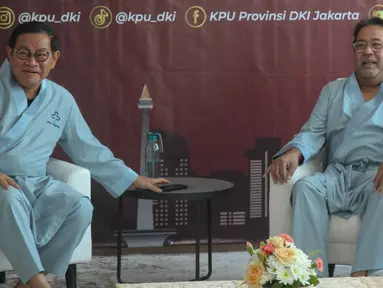 Pasangan bakal calon gubernur-calon wakil gubernur Jakarta 2024, Pramono Anung-Rano Karno bersiap memberikan keterangan sebelum menjalani pemeriksaan Kesehatan di RSUD Tarakan, Jakarta, Jumat (30/8/2024). (Liputan6.com/Herman Zakharia)