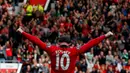 Wayne Rooney melakukan selebrasi setelah mencetak gol tendangan bebas dari luar kotak pinalti pada pertandingan sepak bola Liga Inggris antara Manchester United vs Crystal Palace di Old Trafford di Manchester (14/09/13). (AFP/Andrew Yates)