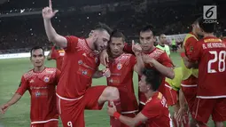 Striker Persija Jakarta, Marko Simic, merayakan gol ke gawang Bali United pada final Piala Presiden di Stadion Utama GBK, Senayan, Jakarta, Sabtu (17/2). Persija Jakarta sementara unggul 2-0 atas Bali United. (Liputan6.com/Arya Manggala)