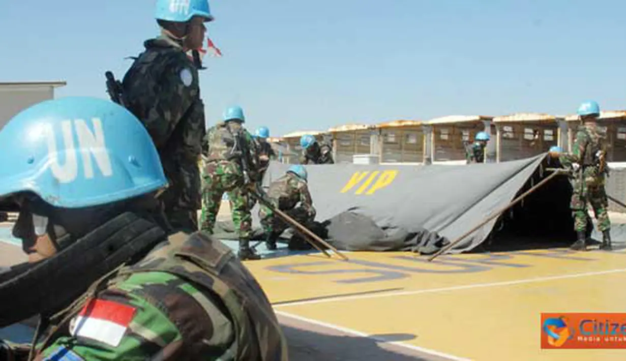 Citizen6, Lebanon: Prajurit Indobatt yang sedang mengamankan proses pendirian tenda.
