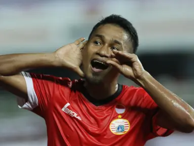 Pemain Persija, Ramdani Lestaluhu merayakan gol keduanya ke gawang Bhayangkara FC pada laga penutup Liga 1 Indonesia di Stadion Patriot Candrabhaga, Bekasi, Minggu (12/11). Persija unggul 2-1. (Liputan6.com/Helmi Fithriansyah)