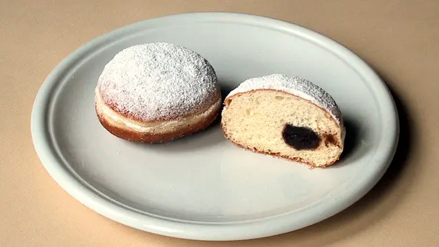 Krapfen, hidangan penutup mirip donat yang berasal dari Austria.
