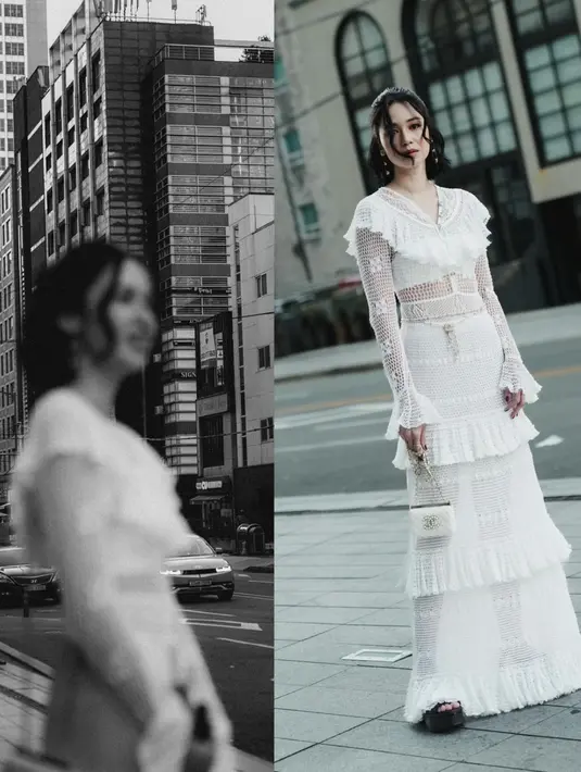 Dress putih hadirkan gaya yang begitu memikat. Cutting sederhana dengan aksen renda menghadirkan pesona yang begitu menawan.  [Foto: Instagram/ Laura Basuki]