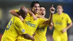Villarreal's Joan Capdevila celebrates with Giusepe Rosi and Marcos Senna after scoring against Aalborg during their group E Champions League football match at the Madrigal Stadium in Villarreal on October 21, 2008. AFP PHOTO/DIEGO TUSON 