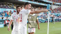 Gelandang Spanyol, Ferran Torres melakukan selebrasi usai mencetak gol keempat Spanyol ke gawang Slovakia dalam laga Grup E Euro 2020 di La Cartuja Stadium, Sevilla, Rabu (23/6/2021) malam WIB. (Foto: AP/Pool/Jose Manuel Vidal)