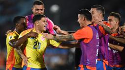 Uruguay tertinggal lebih dulu pada menit ke-31 setelah tendangan keras pemain tengah Kolombia, Juan Fernando Quintero gagal dibendung kiper Sergio Rochet. (DANTE FERNANDEZ/AFP)
