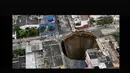 Sinkhole paling tersohor berada di Ibu Kota Guatemala City, Guatemala. Peristiwa yang terjadi pada 30 Mei 2010 ini menyebabkan sebuah gedung tertelan ke dalam lubang selebar 18,2 meter dengan kedalaman 91,4 meter. (Istimewa)