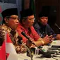  Ketua PBNU KH Said Aqil Siradj memberikan keterangan di sela-sela Musyawarah Nasional Alim Ulama dan Konferensi Besar Nahdlatul Ulama (Liputan6/JohanTallo)