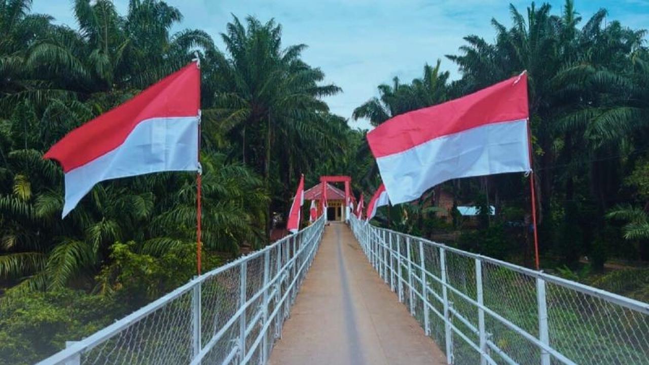 Brimob Sumut Selesaikan Perbaikan Jembatan Gantung di Paluta, Permudah Akses Warga