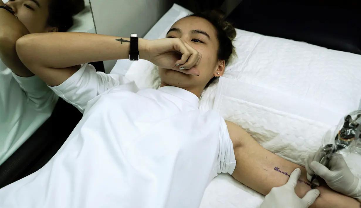 Hormati Raja Thailand, Warga Ini Mentato Tubuhnya - Foto Liputan6.com