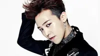 G-Dragon mengenakan pakaian tebal saat berada di bandara. (via. Dramafever)