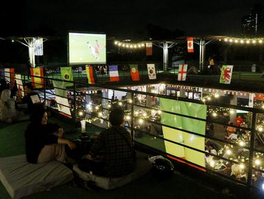 Ada keseruan yang terjadi di 15th Park Kemang, Jakarta pada Jumat (2/12/2022) dalam Acara “Layar Juara Dunia FIFA World Cup 2022” yang menghadirkan nobar antara Korea Selatan Vs Portugal di Piala Dunia 2022. (Bola.com/M iqbal Ichsan)
