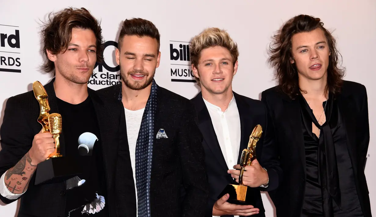 Meski akan vakum, One Direction tetap menyakinkan fans mereka bakal kembali setelah beristirahat sejenak dari perjuangan panjang selama lima tahun. (AFP/Bintang.com)