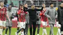 Pelatih AC Milan, Sergio Conceicao merayakan kemenangan timnya atas Parma pada laga lanjutan Liga Italia 2024/2025 di San Siro, Milan, Italia, Senin (27/01/2025) dini hari WIB. (AP Photo/Luca Bruno)