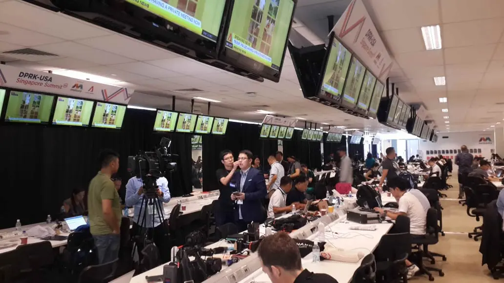 Suasana di International Media Centre KTT Korea Utara-Amerika Serikat di F1 Pit Building Singapura (11/6) (Rizki Akbar Hasan/Liputan6.com)