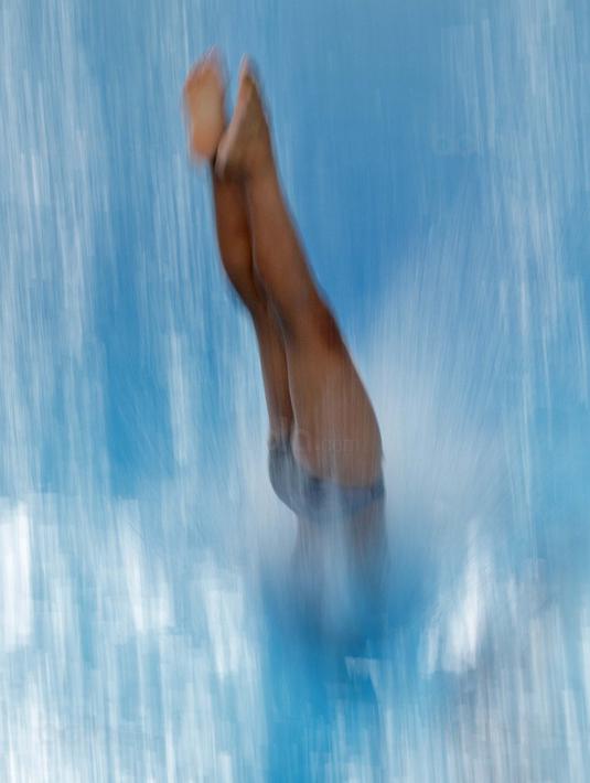 Aksi peloncat indah dari berbagai negara dalam rangka tes event cabang akuatik Asian Games 2018 di kolam renang Senayan, Jakarta yang akang berlangsung dari tanggal 5-15 Desember 2017.  (Bola.com/Peksi Cahyo)