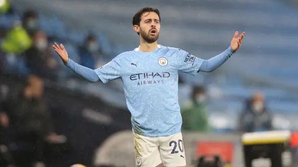 3. Bernardo Silva (Manchester City). Merupakan fans cilik Benfica. Mendapat kesempatan menjadi anak gawang saat pertandingan Liga Eropa melawan Napoli pada 2008. Partai tersebut menjadi pembuka jalan untuk menjadi seorang pemain hebat saat ini. (AFP/Clive Brunskill/Pool)