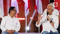 Pasangan bakal capres dan cawapres dari Partai Demokrasi Indonesia Perjuangan (PDIP) Ganjar Pranowo dan Mahfud MD saat menghadiri acara deklarasi dukungan di Gedung Arsip Nasional, Jakarta, Rabu (18/10/2023). (Liputan6.com/Herman Zakharia)