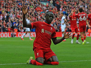 Liverpool sukses bawa poin penuh di depan puluhan ribu fans mereka di Anfield, setelah berhasil mengalahkan Burnley pada pekan kedua Liga Inggris musim 2021/2022. (Foto: AFP/Lindsey Parnaby)