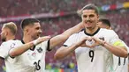Gelandang Austria Marcel Sabitzer berselebrasi usai mencetak gol ketiga untuk timnya ke gawang Belanda pada laga terakhir grup D Euro 2024 di Olympiastadion Berlin, Selasa (25/6) malam WIB. (Michael Kappeler/dpa via AP)